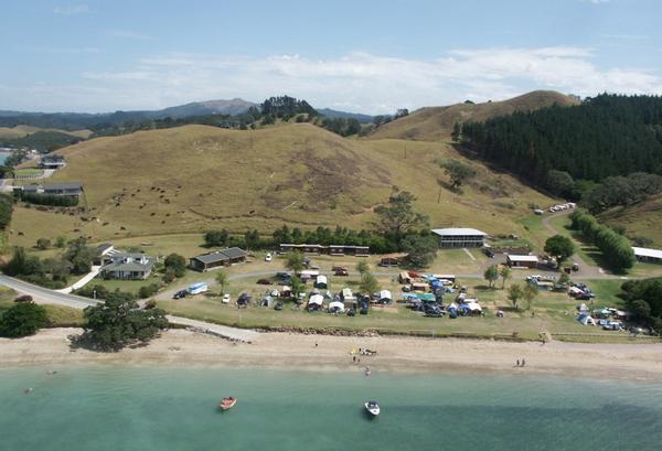 Aerial shot of campground:  Up for mortgagee sale &#8211; the future of the waterfront Whangaruru Motor Camp could be has a holiday home development.